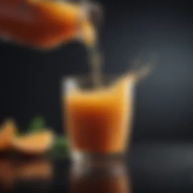 Close-up of juice being poured into a glass