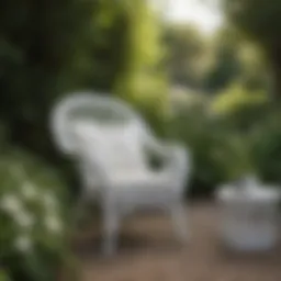 Elegant white wicker outdoor chair set against a lush garden backdrop