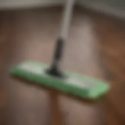 A close-up of a microfiber mop on a hardwood floor
