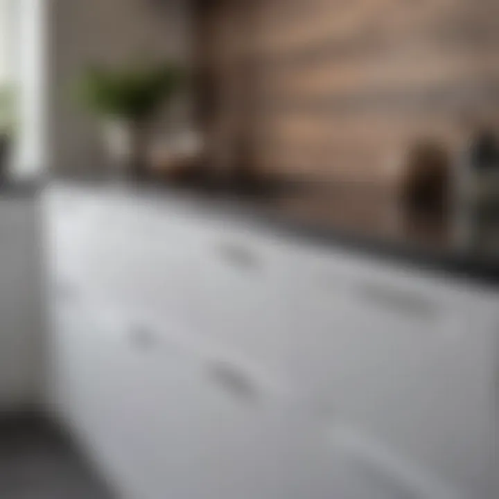 Close-up on dark countertop texture against white cabinetry