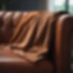 A close-up view of a microfiber cloth for dusting leather furniture