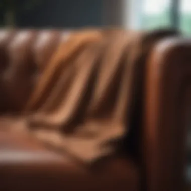 A close-up view of a microfiber cloth for dusting leather furniture