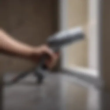 Heat gun in action removing paint from a surface