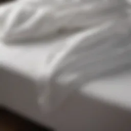 A neatly folded fitted sheet showcasing perfect corners