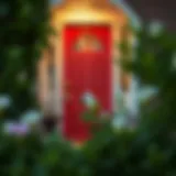 A striking red front door adorned with elegant decor