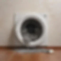 Illustration of a clogged dryer vent with lint buildup